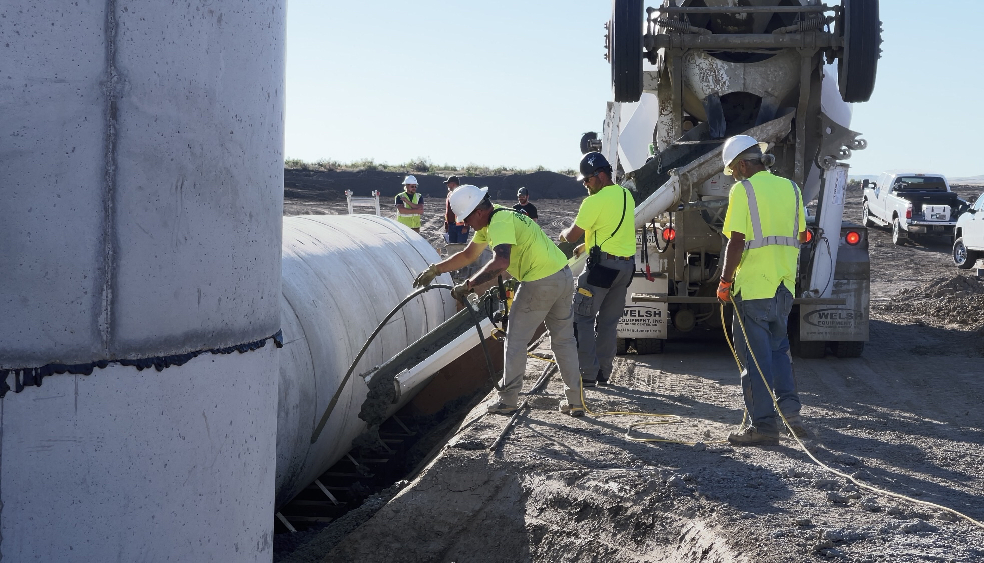 Contractors place new concrete outlet pipes at Grub Dam