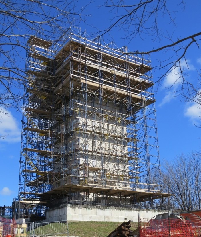 Structure surrounded by scaffolding.