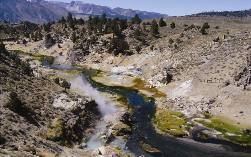 Steam rises from Hot Creek as it flows through the Long Valley Caldera in a volcanically active region of east-central California. 