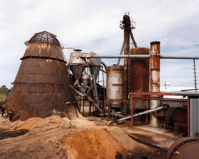 Sawdust being processed to produce more usable forms of biomass. 