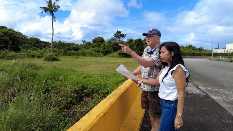 Appraisers at a property in a lush, green area in Guam