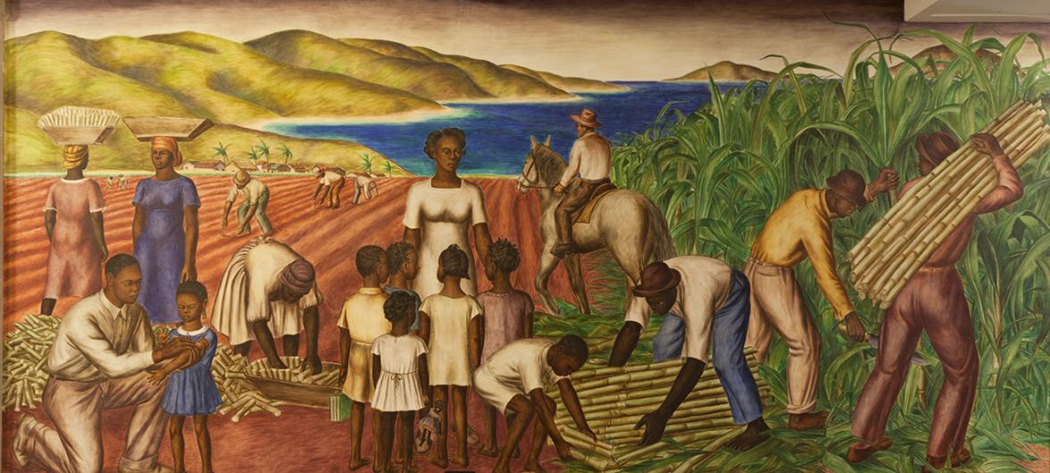 Painted mural depicting people engaged in teaching, medical services, and harvesting of sugar cane.