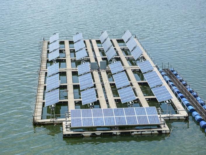 Solar panels floating in the ocean.