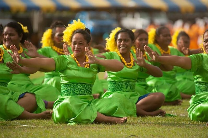 Samoan women perform a traditional dance.