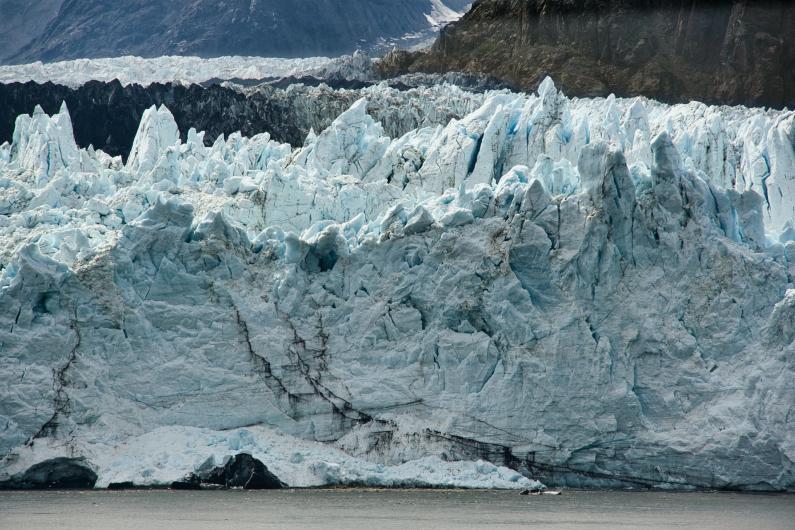 Icy blue glaciers at the water front