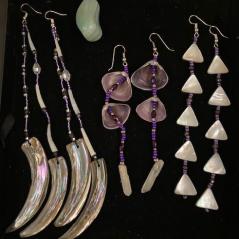 Photograph of earrings with shells, beads, and dentalium.