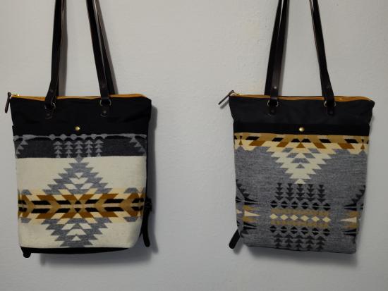 Photograph of two bags hanging side by side.