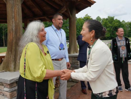 Secretary Haaland is greeted by members of the Gun Lake Tribe during her visit to Michigan