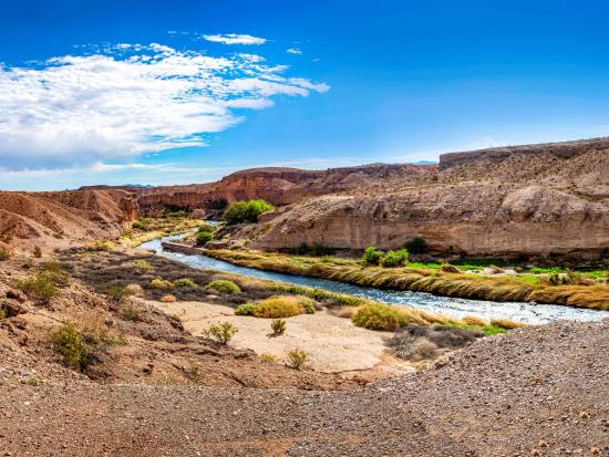 View of river running through high desert landscape