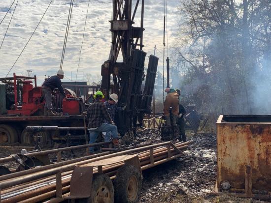 Crew plugging orphaned oil and gas well. 