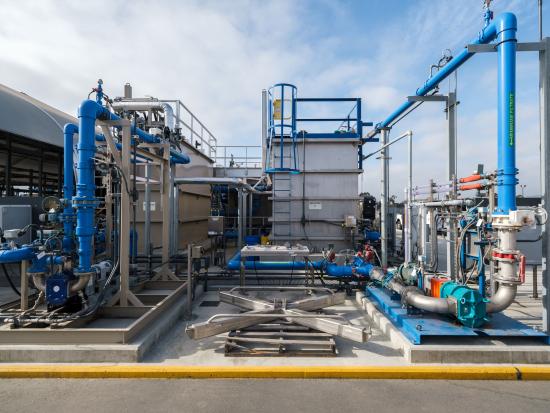 Blue and silver pipes and machinery. 