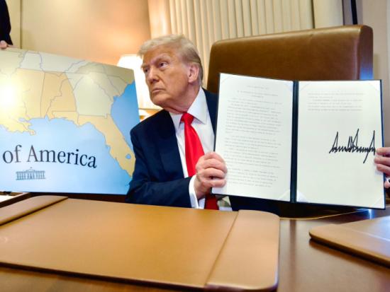 President Trump displays his Executive Order renaming the Gulf of America