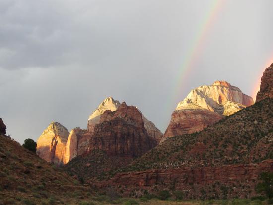A rainbow over buttes in Zion National Park