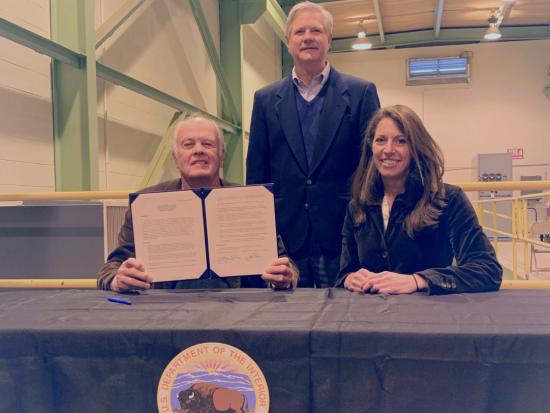 Deputy Secretary MacGregor at the Oakes Test Site title transfer signing ceremony with Dickey-Sargent Irrigation District Chairman David Locken (left) and U.S. Senator John Hoeven (center) in Oakes, North Dakota