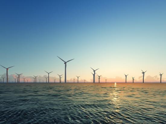 A view of wind turbines on the Blue Sea during sunset