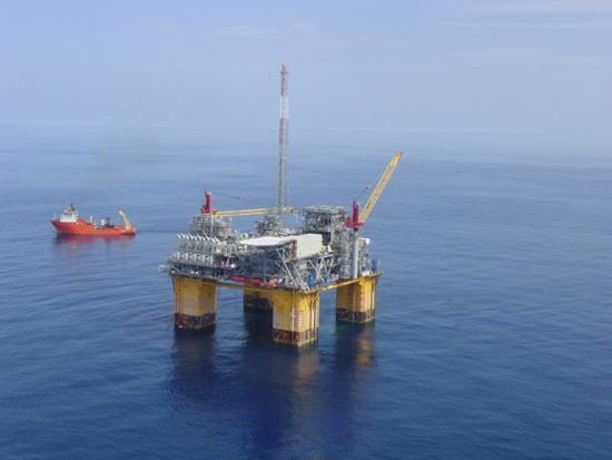 An oil platform in the blue ocean