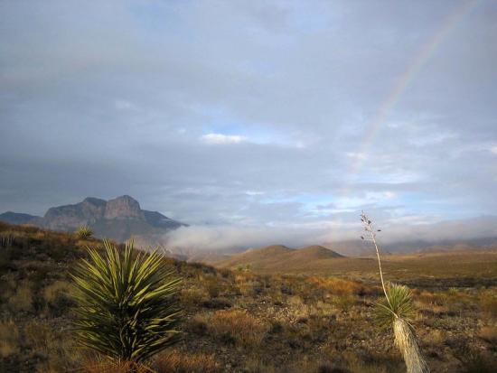 Rainbow over the Guadalupe Mountains.