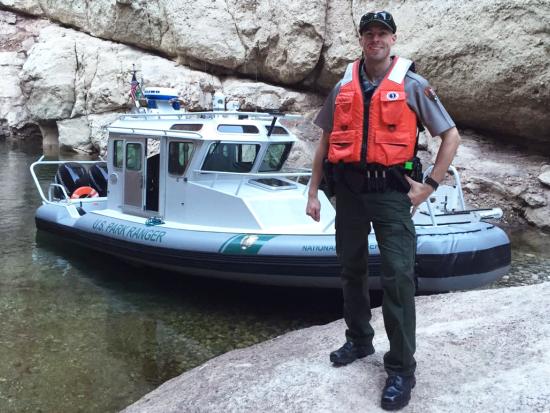 US Park Ranger on boat patrol on Lake Mead