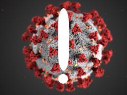 An exclamation point superimposed over a photo of the coronavirus