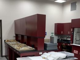 interior of paleo lab with red counters and microscopes