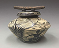 Pottery by Carolyn Bernard Young, Choctaw, entitled "Gathering Bark for Medicine" © 2015