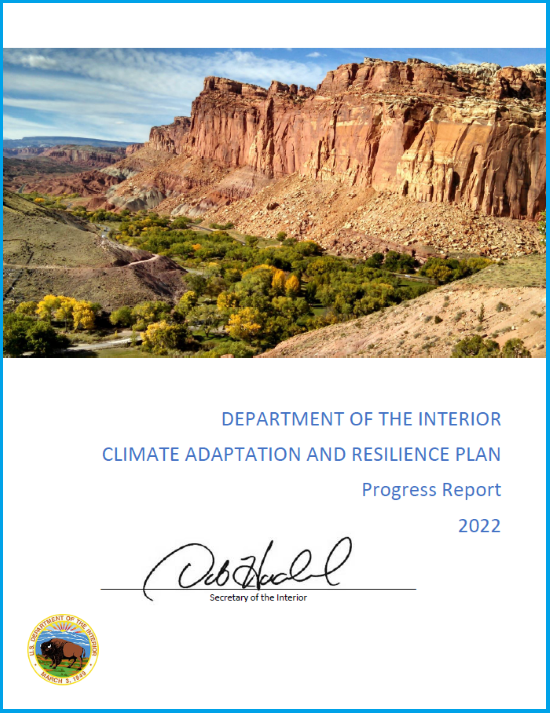 cover of climate plan update with mountains and a river