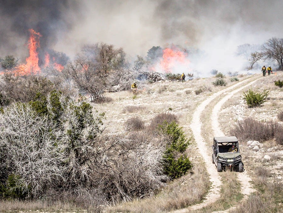 Firefighters monitor a prescribed burn at Balcones Canyonlands National Wildlife Refuge.