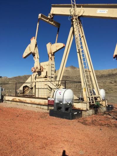 A well pad site, blue sky overhead