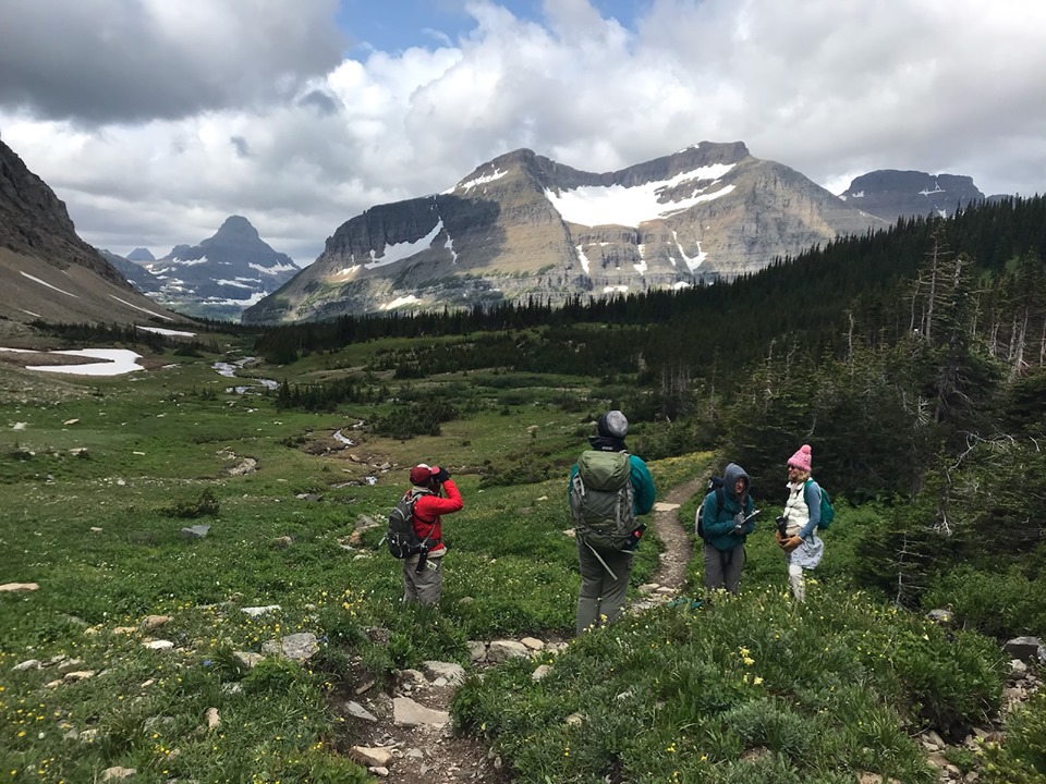 Hikers at base of mountain