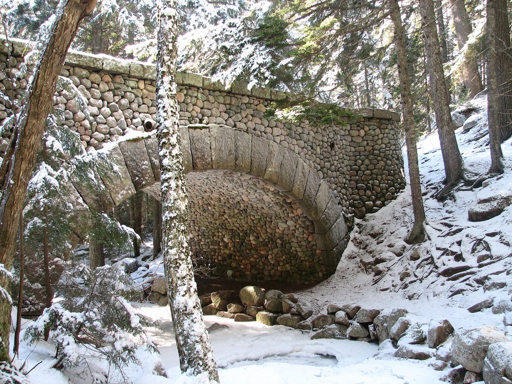 The park's historic carriage road bridges are just as scenic with a little snow on top.